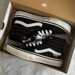 Vans Classic Black and White High-Top Sneakers